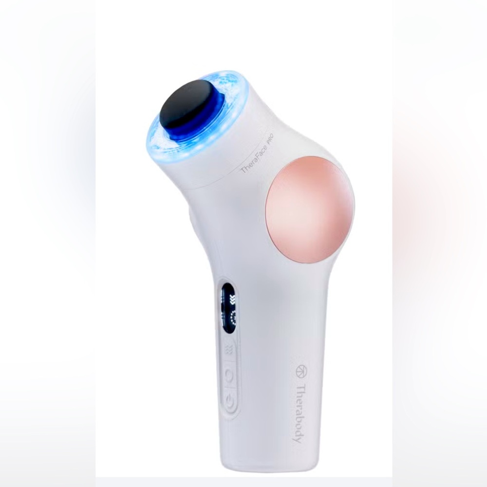 Therabody Theraface Pro White with Pink Highlights.